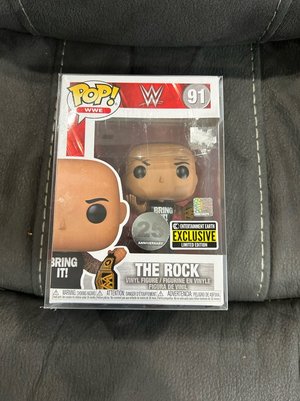 WWE The Rock funko pop! Entertainment earth exclusive! Comes with defended case!